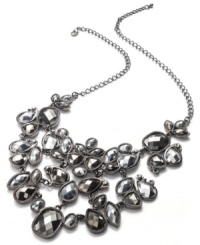 Shimmering stones bring sophistication. This bib necklace from Style&co. is crafted from hematite tone mixed metal with silver tone plastic stones in a range of shapes. Approximate length: 18 inches + 2-inch extender. Approximate drop: 3 inches. Shimmering stones bring sophistication. This bib necklace from Style&co. is crafted from hematite tone mixed metal with silver tone plastic stones in a range of shapes. Approximate length: 18 inches + 2-inch extender. Approximate drop: 3 inches.
