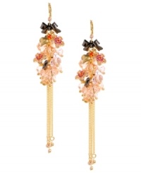 Colorful clusters. Betsey Johnson's mixed metal earrings are a pretty little mix of everything: ombre pave crystal accents, gold tone and hematite-plated bubble hearts, pink faceted beads, hematite-plated bow details, and gold tone multi chains with small crystals. A gold tone ear wire holds everything up. Approximate drop 4-1/4 inches. Colorful clusters. Betsey Johnson's mixed metal earrings are a pretty little mix of everything: ombre pave crystal accents, gold tone and hematite-plated bubble hearts, pink faceted beads, hematite-plated bow details, and gold tone multi chains with small crystals. A gold tone ear wire holds everything up. Approximate drop 4-1/4 inches.