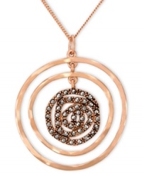 Add some glitter and glam to your look. Genevieve & Grace's pretty graduated circle drop pendant features sparkling marcasite in 18k rose gold over sterling silver. Approximate length: 18 inches. Approximate drop: 1-11/16 inches. Add some glitter and glam to your look. Genevieve & Grace's pretty graduated circle drop pendant features sparkling marcasite in 18k rose gold over sterling silver. Approximate length: 18 inches. Approximate drop: 1-11/16 inches.