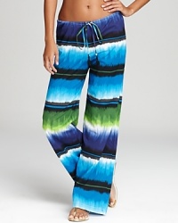 Saunter along the sea in these Tommy Bahama coverup pants. Their pleasant print and relaxed fit are ideal for a stroll in the sand. Saunter along the sea in these Tommy Bahama coverup pants. Their pleasant print and relaxed fit are ideal for a stroll in the sand.