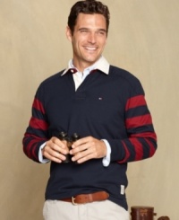 This rugby shirt from Tommy Hilfiger is a vintage varsity-inspired must-have for the season. This rugby shirt from Tommy Hilfiger is a vintage varsity-inspired must-have for the season.