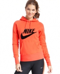 Brighten up your workouts in this colorful hoodie from Nike. A cozy kangaroo pocket keeps your belongings on-hand while keeping your hands warm! Brighten up your workouts in this colorful hoodie from Nike. A cozy kangaroo pocket keeps your belongings on-hand while keeping your hands warm!