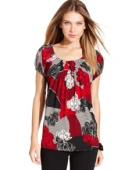 Style&co.'s floral-print top will easily add a splash of bold color to your outfit. Style&co.'s floral-print top will easily add a splash of bold color to your outfit.