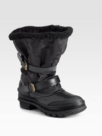 Unstructured yet sturdy weather-resistant nylon and rubber style with double-strap detail and lambskin lining.Shaft, 9 Leg circumference, 22 Nylon and rubber upper Round toe Pull-on style Back logo patch Padded insole Rubber lug sole Made in Italy Fur origin: Romania OUR FIT MODEL RECOMMENDS ordering one half size up as this style runs small. Unstructured yet sturdy weather-resistant nylon and rubber style with double-strap detail and lambskin lining.Shaft, 9 Leg circumference, 22 Nylon and rubber upper Round toe Pull-on style Back logo patch Padded insole Rubber lug sole Made in Italy Fur origin: Romania OUR FIT MODEL RECOMMENDS ordering one half size up as this style runs small.
