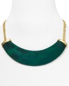 A bold polished resin horn punctuates this Kenneth Jay Lane necklace, which lends a fashion-forward feel to a simply styled 22-karat gold plated chain.