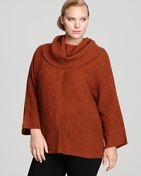 Ushering in a season of separates, this Eileen Fisher Plus sweater makes a bold statement with a swingy silhouette and an oversized cowl neckline. Ushering in a season of separates, this Eileen Fisher Plus sweater makes a bold statement with a swingy silhouette and an oversized cowl neckline.