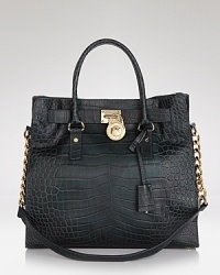 Clean and simply detailed, this versatile MICHAEL Michael Kors tote flaunts effortless style on-duty or off.