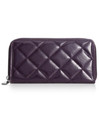 Take a shine to everyday accessorizing with this glossy goodie from Style&co. Ideally sized to slip inside a handbag, it boasts plenty of pockets and compartments to stow your stash. Take a shine to everyday accessorizing with this glossy goodie from Style&co. Ideally sized to slip inside a handbag, it boasts plenty of pockets and compartments to stow your stash.