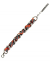 Intertwined appeal. BCBGeneration gives a colorful twist to its chain link bracelet, crafted from silver-tone mixed metal. An orange and gray cord adds a vibrant touch. Approximate length: 8 inches. Intertwined appeal. BCBGeneration gives a colorful twist to its chain link bracelet, crafted from silver-tone mixed metal. An orange and gray cord adds a vibrant touch. Approximate length: 8 inches.