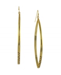 Intergalactic glamour. These other-worldly earrings by BCBGeneration take traditional hoop earrings and throw in a modern twist with the addition of sparkling jet glass accents. Crafted in antique gold tone mixed metal. Approximate diameter: 3 inches. Intergalactic glamour. These other-worldly earrings by BCBGeneration take traditional hoop earrings and throw in a modern twist with the addition of sparkling jet glass accents. Crafted in antique gold tone mixed metal. Approximate diameter: 3 inches.