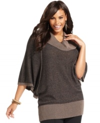 Stay warm and fashionable this season with Style&co.'s dolman sleeve plus size sweater, finished by a cowl neckline. Stay warm and fashionable this season with Style&co.'s dolman sleeve plus size sweater, finished by a cowl neckline.