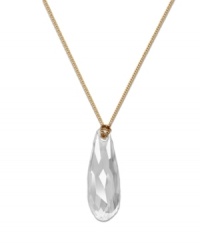 Make a simple, stylish statement with Swarovski's crystal drop pendant--it's easy to mix and match with virtually any outfit and for any time of year. Crafted in gold tone mixed metal. Approximate length: 15 inches. Approximate drop: 1-1/8 inches.
