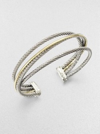 An iconic style with a crossover design featuring sleek sterling silver cables accented with radiant 18k gold. Sterling silver18k goldDiameter, about 2.5Slip-on styleImported An iconic style with a crossover design featuring sleek sterling silver cables accented with radiant 18k gold. Sterling silver18k goldDiameter, about 2.5Slip-on styleImported