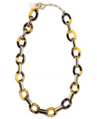 Marvelously modern. This Anne Klein necklace harnesses the beauty of golden hues and trendy tortoise to perfection. Crafted in gold tone mixed metal with tortoise resin links. Approximate length: 16-inches + 2-inch extender. Marvelously modern. This Anne Klein necklace harnesses the beauty of golden hues and trendy tortoise to perfection. Crafted in gold tone mixed metal with tortoise resin links. Approximate length: 16-inches + 2-inch extender.
