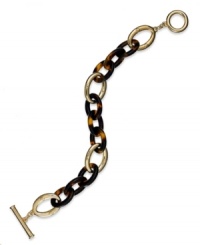 Trendy tortoise for the modern woman. With oval links and a toggle closure, this Lauren Ralph Lauren bracelet is crafted in 14k gold-plated mixed metal and tortoise resin. Approximate length: 7-1/2 inches. Trendy tortoise for the modern woman. With oval links and a toggle closure, this Lauren Ralph Lauren bracelet is crafted in 14k gold-plated mixed metal and tortoise resin. Approximate length: 7-1/2 inches.