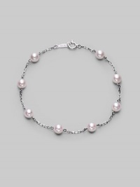 From the Akoya Collection. A delicate chain, sprinkled with lustrous white cultured Akoya pearls. 5mm white, round cultured pearls Quality: A+ 18k white gold Length, about 7 Spring ring clasp Imported From the Akoya Collection. A delicate chain, sprinkled with lustrous white cultured Akoya pearls. 5mm white, round cultured pearls Quality: A+ 18k white gold Length, about 7 Spring ring clasp Imported