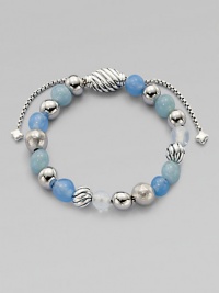 From the Spiritual Bead Collection. Singing the blues with a pretty strand in soft blue shades, combining beads of blue chalcedony, aquamarine, moon quartz and sterling silver with an oval cable slide clasp.Blue chalcedony, aquamarine and moon quartzSterling silverDiameter, about 2Adjustable slide claspImported From the Spiritual Bead Collection. Singing the blues with a pretty strand in soft blue shades, combining beads of blue chalcedony, aquamarine, moon quartz and sterling silver with an oval cable slide clasp.Blue chalcedony, aquamarine and moon quartzSterling silverDiameter, about 2Adjustable slide claspImported