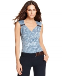 Faux leather buckles at the shoulders of this petite MICHAEL Michael Kors top are a dapper detail and chic finishing touch. Faux leather buckles at the shoulders of this petite MICHAEL Michael Kors top are a dapper detail and chic finishing touch.
