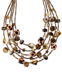 Beachside style just in time for the warm season. This Style&co. frontal necklace features five rows of shimmery shells, glass, seed and plastic bead accents. Set in gold tone mixed metal. Approximate length: 18 inches + 2-inch extender. Beachside style just in time for the warm season. This Style&co. frontal necklace features five rows of shimmery shells, glass, seed and plastic bead accents. Set in gold tone mixed metal. Approximate length: 18 inches + 2-inch extender.
