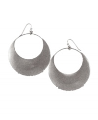 Add stellar style in Jessica Simpson's eclipsing moon drops. Earrings feature cut-out hoops crafted in silver tone mixed metal. Approximate drop: 2 inches. Add stellar style in Jessica Simpson's eclipsing moon drops. Earrings feature cut-out hoops crafted in silver tone mixed metal. Approximate drop: 2 inches.