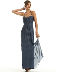 The ruffled and ruched long dress is a statement of pure femininity. With sweetheart neckline that ties behind, ruched bodice and pleated skirt. Fully lined. Invisible back zip. Built-in boning for extra support. The ruffled and ruched long dress is a statement of pure femininity. With sweetheart neckline that ties behind, ruched bodice and pleated skirt. Fully lined. Invisible back zip. Built-in boning for extra support.
