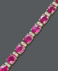 Imagine her surprise when she receives this stunning gift. Effy Collection's vibrant tennis bracelet highlights oval-cut rubies (12 ct. t.w.) and sparkling, round-cut diamonds (1/4 ct. t.w.). Crafted in 14k gold with a figure 8 safety clasp. Approximate length: 7-1/2 inches. Imagine her surprise when she receives this stunning gift. Effy Collection's vibrant tennis bracelet highlights oval-cut rubies (12 ct. t.w.) and sparkling, round-cut diamonds (1/4 ct. t.w.). Crafted in 14k gold with a figure 8 safety clasp. Approximate length: 7-1/2 inches.