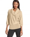 Style&co.'s shimmering metallic sweater creates a sleek relaxed look with its banded hem and draped neckline!