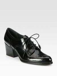 Menswear-inspired design of shiny leather with classic perforated details, heightened by a substantial heel. Stacked heel, 2¼ (60mm)Leather upperLeather liningRubber solePadded insoleImported Menswear-inspired design of shiny leather with classic perforated details, heightened by a substantial heel. Stacked heel, 2¼ (60mm)Leather upperLeather liningRubber solePadded insoleImported