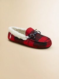 A classic slip-on slipper lined in plush faux shearling with a preppy woven plaid design.Slip-onWool upperFaux shearling liningRubber solePadded insoleImported A classic slip-on slipper lined in plush faux shearling with a preppy woven plaid design.Slip-onWool upperFaux shearling liningRubber solePadded insoleImported