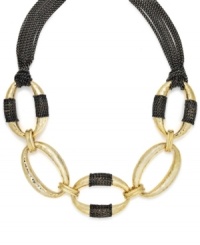 Urban chic. Chunky oval links and a multitude of thin chains adorn Alfani's bold statement necklace. Crafted in gold and hematite tone mixed metal. Approximate length: 18 inches + 3-inch extender. Urban chic. Chunky oval links and a multitude of thin chains adorn Alfani's bold statement necklace. Crafted in gold and hematite tone mixed metal. Approximate length: 18 inches + 3-inch extender.