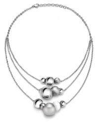 The possibilities are endless. Breil's chic stainless steel necklace can be worn in a variety of ways -- as a clustered statement necklace, as a subtle illusion necklace, or as a trendy station necklace. Polished and satin finish spheres and a white natural stone are easily moved to create the look of your choice. Approximate length: 18 inches. The possibilities are endless. Breil's chic stainless steel necklace can be worn in a variety of ways -- as a clustered statement necklace, as a subtle illusion necklace, or as a trendy station necklace. Polished and satin finish spheres and a white natural stone are easily moved to create the look of your choice. Approximate length: 18 inches.