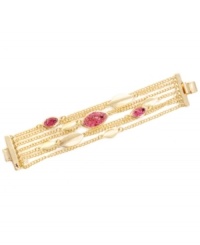 A purple crush. This multi-row bracelet by Kenneth Cole New York features crushed glass gems in vibrant purple hues mixed with oval disc charms. Crafted in gold tone mixed metal. Approximate length: 7-1/4 inches. A purple crush. This multi-row bracelet by Kenneth Cole New York features crushed glass gems in vibrant purple hues mixed with oval disc charms. Crafted in gold tone mixed metal. Approximate length: 7-1/4 inches.