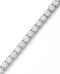 Match point. Arabella's stunning tennis bracelet combines dozens of round-cut Swarovski zirconias (31 ct. t.w.) in polished sterling silver. Approximate length: 7-1/2 inches. Match point. Arabella's stunning tennis bracelet combines dozens of round-cut Swarovski zirconias (31 ct. t.w.) in polished sterling silver. Approximate length: 7-1/2 inches.
