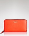 Not all wallets are this bright. This kate spade new york style earns top marks with its well-organized zip around design and 12 credit card slots. Yeah, it's brilliant.