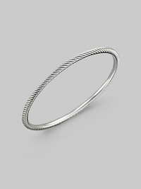 From the Cable Bangle Collection. Textured on the outside and smooth on the inside in cool sterling silver. Sterling silver Diameter, about 2½ Made in USA From the Cable Bangle Collection. Textured on the outside and smooth on the inside in cool sterling silver. Sterling silver Diameter, about 2½ Made in USA
