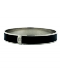 Perfectly versatile. Vince Camuto's skinny bangle adds a thin layer of color that pairs well with any look. Wear it alone or stack it with other trendy styles. Crafted in silver tone mixed metal with a strip of black patent leather. Approximate diameter: 3 inches. Perfectly versatile. Vince Camuto's skinny bangle adds a thin layer of color that pairs well with any look. Wear it alone or stack it with other trendy styles. Crafted in silver tone mixed metal with a strip of black patent leather. Approximate diameter: 3 inches.
