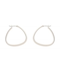 Traditional hoops with an up-to-date twist. Kenneth Cole New York earrings feature a modern pear-shaped hoop in silver tone mixed metal. Approximate diameter: 1 inch.