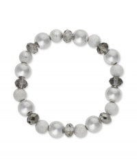 Sandblasted metal, copper-coated metal and glass beads make Charter Club's stretch bracelet a unique addition to your jewelry collection. Crafted in silver tone mixed metal. Approximate length: 7-1/2 inches. Sandblasted metal, copper-coated metal and glass beads make Charter Club's stretch bracelet a unique addition to your jewelry collection. Crafted in silver tone mixed metal. Approximate length: 7-1/2 inches.