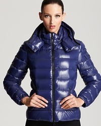 Moncler's Bady puffer showcases a royal blue hue that stands out on the slopes and streets alike. Black hardware lends a modern feel. Moncler's Bady puffer showcases a royal blue hue that stands out on the slopes and streets alike. Black hardware lends a modern feel.