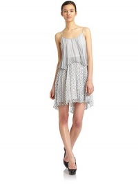 THE LOOKAllover polka dot patternSleevelessShear, pleated overlay detailConcealed back zipPleated throughoutTHE FITAbout 37 from shoulder to hemTHE MATERIALSilkFully linedCARE & ORIGINDry cleanImportedModel shown is 5'10 (177cm) wearing US size 4. THE LOOKAllover polka dot patternSleevelessShear, pleated overlay detailConcealed back zipPleated throughoutTHE FITAbout 37 from shoulder to hemTHE MATERIALSilkFully linedCARE & ORIGINDry cleanImportedModel shown is 5'10 (177cm) wearing US size 4.