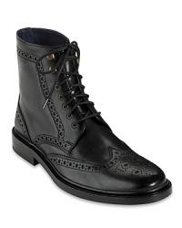 Adorned with traditional brogue detail, these powerfully cool wingtip boots elevate your look and keep you grounded in comfort with the benefits of Nike Air technology. Adorned with traditional brogue detail, these powerfully cool wingtip boots elevate your look and keep you grounded in comfort with the benefits of Nike Air technology.