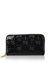 Carry your daytime essentials in style with this glossy patent continental wallet from Tory Burch. Carry your daytime essentials in style with this glossy patent continental wallet from Tory Burch.