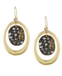 Intergalactic glamour. Kenneth Cole New York's modern orbital earrings feature a gold tone mixed metal fish wire and ring wrapped around a crystal-accented disc in hematite hues. Approximate drop: 1-3/4 inches. Intergalactic glamour. Kenneth Cole New York's modern orbital earrings feature a gold tone mixed metal fish wire and ring wrapped around a crystal-accented disc in hematite hues. Approximate drop: 1-3/4 inches.