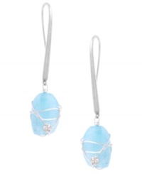 It's a wrap! Wrapped jewelry styles are the latest craze and Kenneth Cole New York's stunning design is no exception. Earrings feature a semi-precious blue quartz stone, sparkling crystal accents, and a silver tone mixed metal setting. Approximate drop: 2-1/4 inches. It's a wrap! Wrapped jewelry styles are the latest craze and Kenneth Cole New York's stunning design is no exception. Earrings feature a semi-precious blue quartz stone, sparkling crystal accents, and a silver tone mixed metal setting. Approximate drop: 2-1/4 inches.