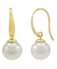 From Spain comes Majorica's interpretation of a fashion classic: pearl earrings. Set in 18k gold over sterling silver, round white organic man-made pearls stun (10 mm). Approximate drop: 1-1/4 inches. From Spain comes Majorica's interpretation of a fashion classic: pearl earrings. Set in 18k gold over sterling silver, round white organic man-made pearls stun (10 mm). Approximate drop: 1-1/4 inches.
