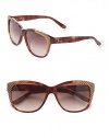 THE LOOKRound cat's-eye silhouetteAcetate framesMetal logo at temple UV protectionSignature case includedTHE COLORTortoise frames with striped detailing and brown gradient lensesORIGINMade in France