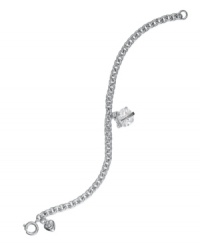 Let your heart shine on. Juicy Couture's darling heart charm bracelet sparkles with a faceted cubic zirconia embellished with a logo banner. Crafted in silver tone mixed metal. Approximate length: 8 inches. Approximate drop: 1/2 inch. Let your heart shine on. Juicy Couture's darling heart charm bracelet sparkles with a faceted cubic zirconia embellished with a logo banner. Crafted in silver tone mixed metal. Approximate length: 8 inches. Approximate drop: 1/2 inch.