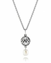 PANDORA's sterling silver and white pearl necklace puts a modern spin on classic style. PANDORA's sterling silver and white pearl necklace puts a modern spin on classic style.