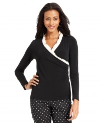 Charter Club's faux-wrap petite top features a ruffled neckline for a feminine touch. Pair it with printed pants for an of-the-moment ensemble. Charter Club's faux-wrap petite top features a ruffled neckline for a feminine touch. Pair it with printed pants for an of-the-moment ensemble.