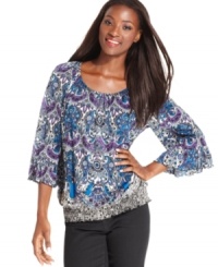 Style&co.'s peasant top is perfected with a vibrant print and pretty sleeves with ruffled cuffs. Style&co.'s peasant top is perfected with a vibrant print and pretty sleeves with ruffled cuffs.